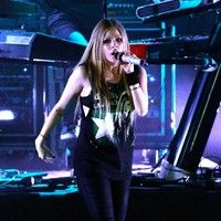 Avril Lavigne performs live during her 'Black Star Tour' photos